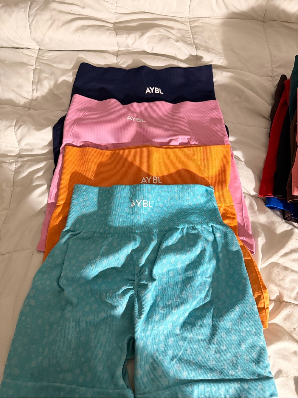 AYBL Girls Bike Shorts — Teal, Orange, Pink & Navy Stack